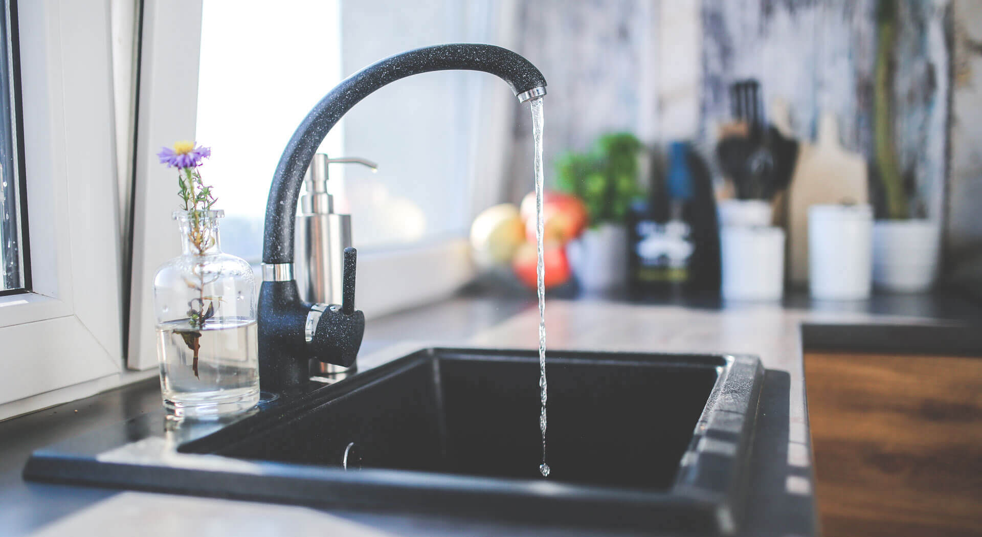 thid image shows a tap with water flowing